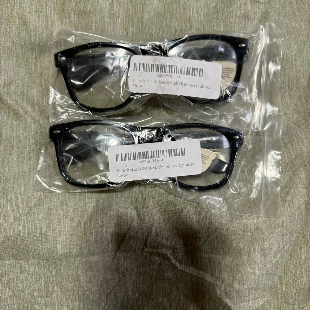 Clear black framed glasses. New. Set of 2